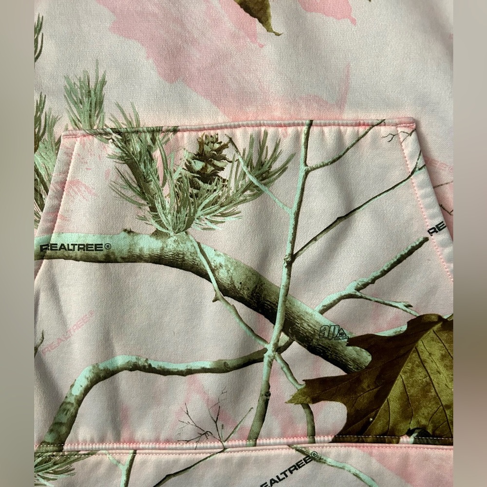 Under Armour Women's Pullover Hoodie in a pink Realtree camouflage pattern. - Picture 5 of 7